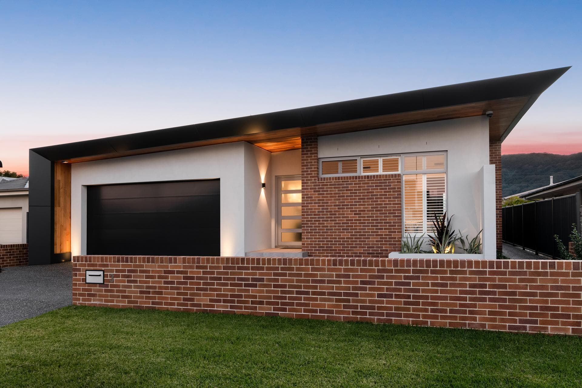 Angled view highlighting ALPOLIC™/fr cladding defining strong roofline and façade geometry