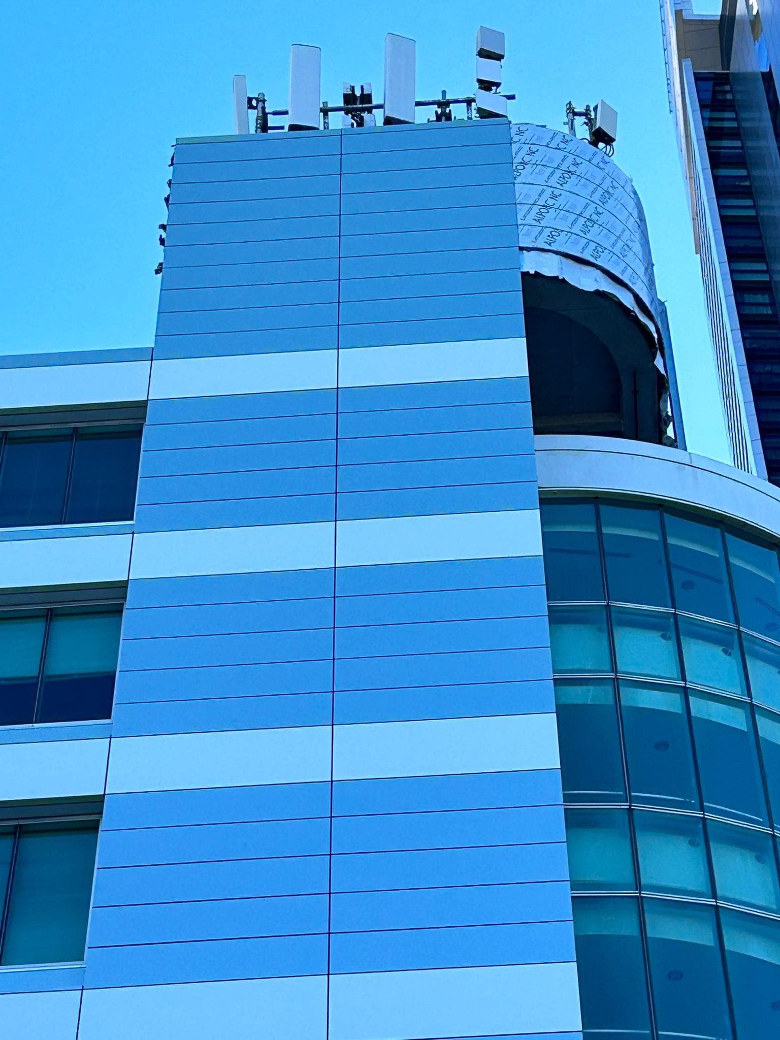 Curved façade reclad using ALPOLIC™ NC/A1 at Telstra Chatswood data exchange