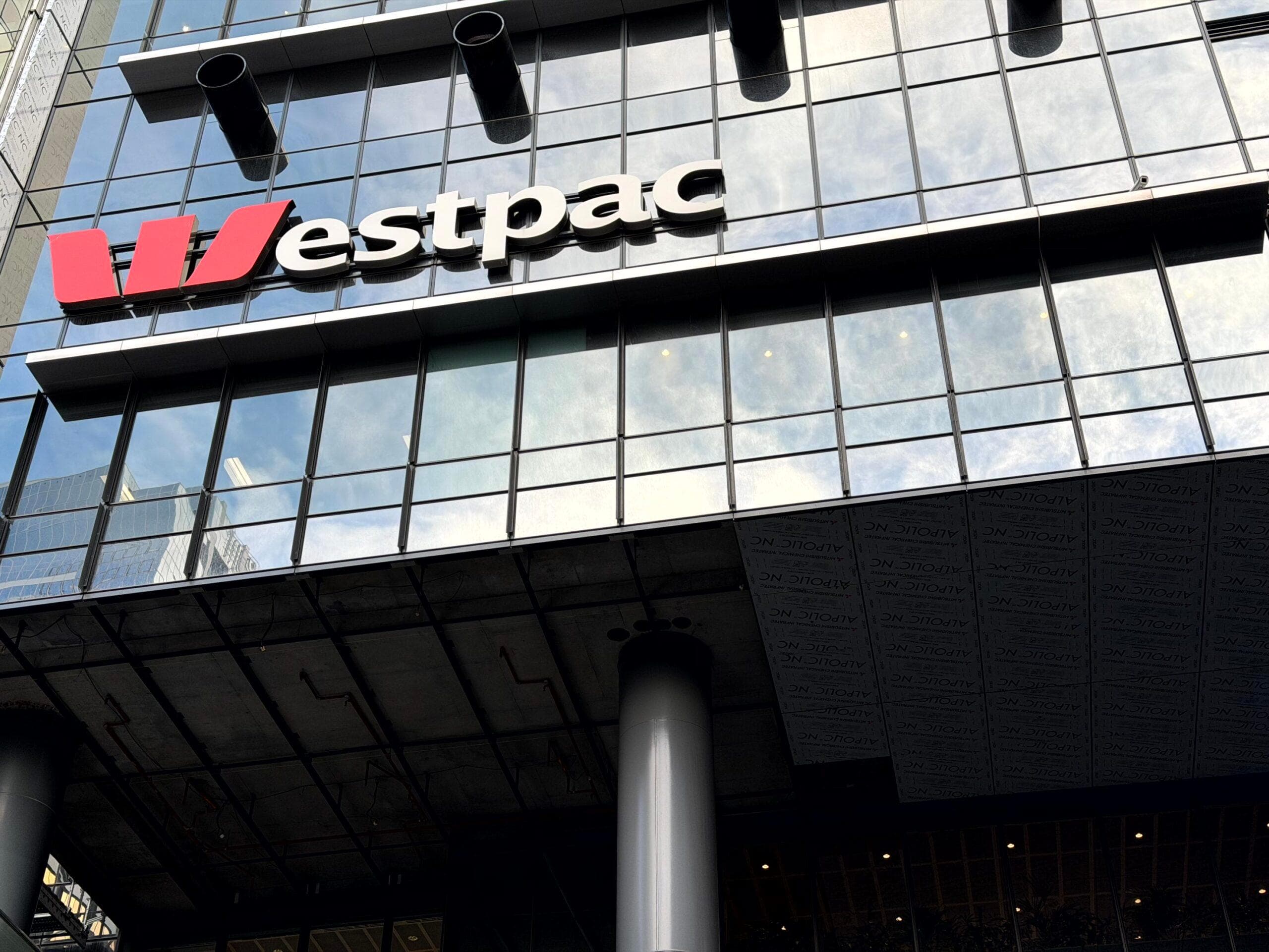 Westpac signage on the reflective glass façade above an ALPOLIC™ panelled soffit